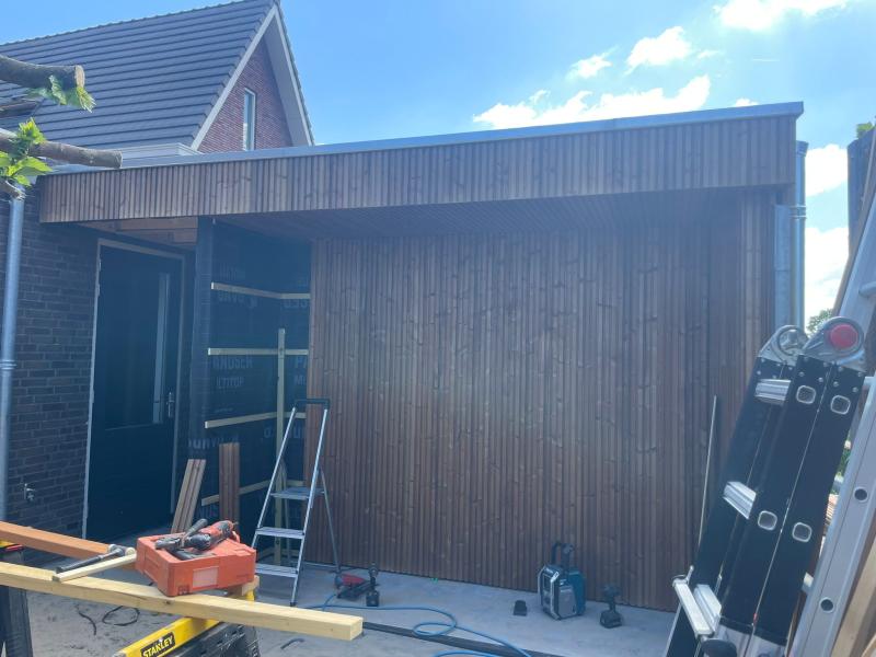 Project foto van Buitenverblijf met geïntegreerde buitenkeuken 