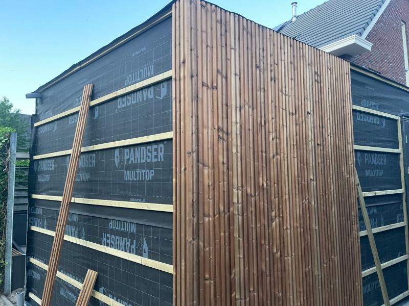 Project foto van Buitenverblijf met geïntegreerde buitenkeuken 