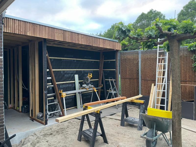 Project foto van Buitenverblijf met geïntegreerde buitenkeuken 